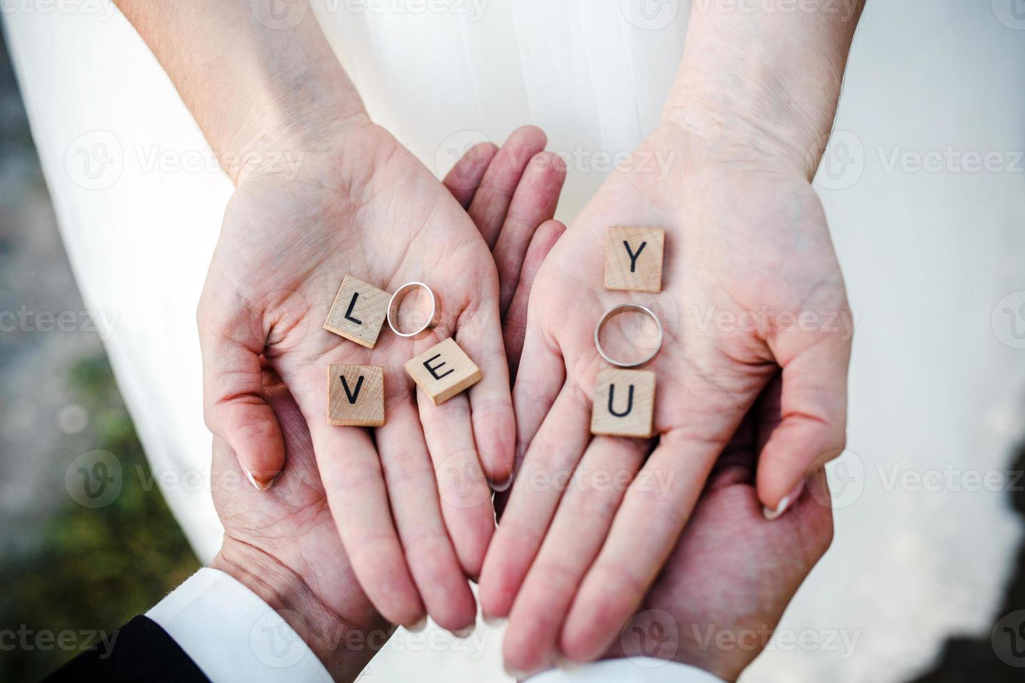 Cute message Love you in hands . photo