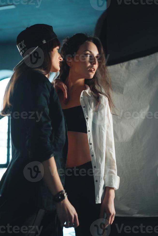 Two hipster girls posing for the camera photo