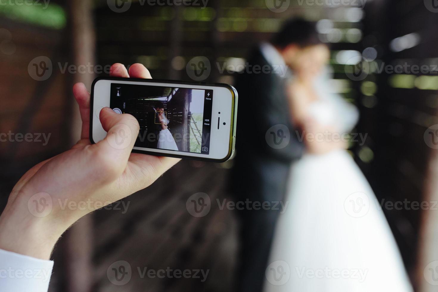 Photo of beautiful couple on nature in wooden hut