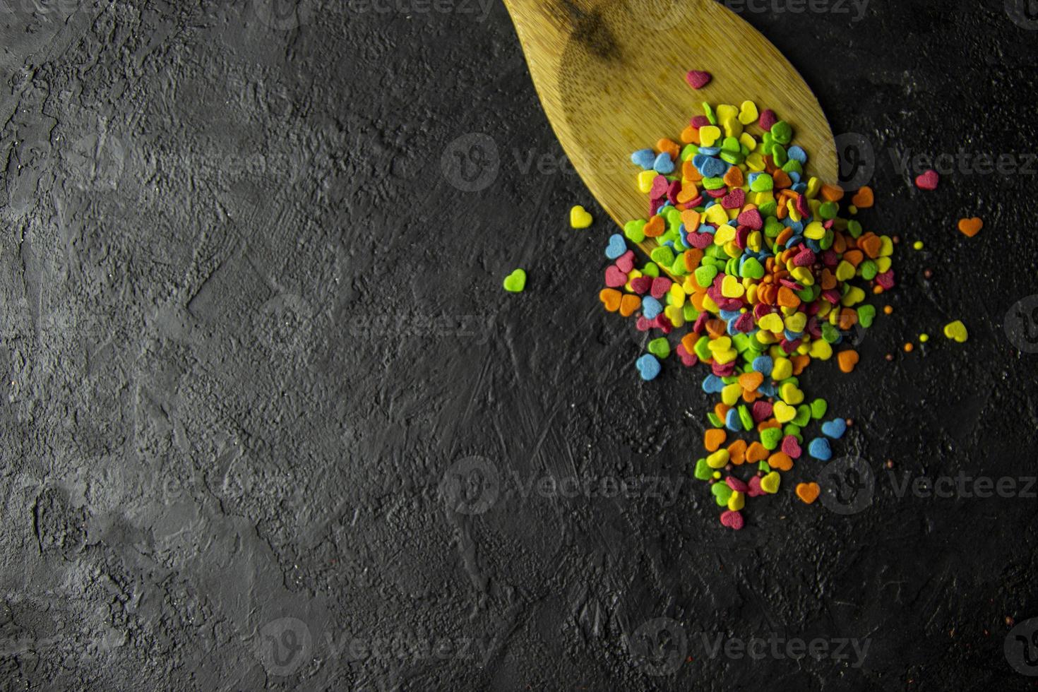 Sweets on a dark stone background photo