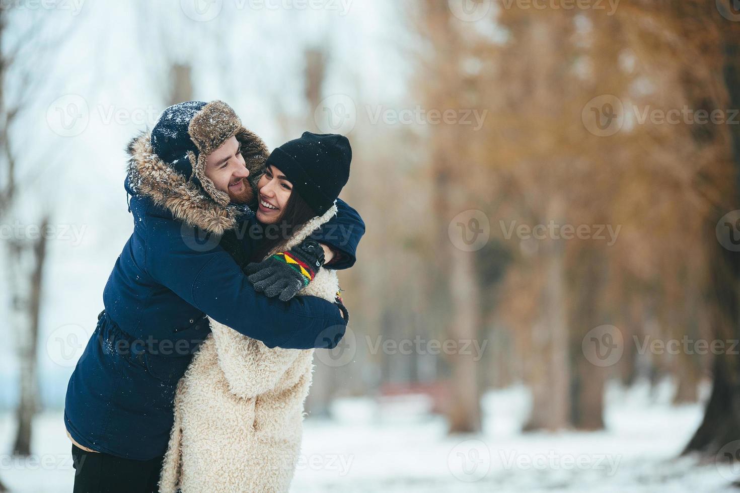 guy and girl in each other's arms photo