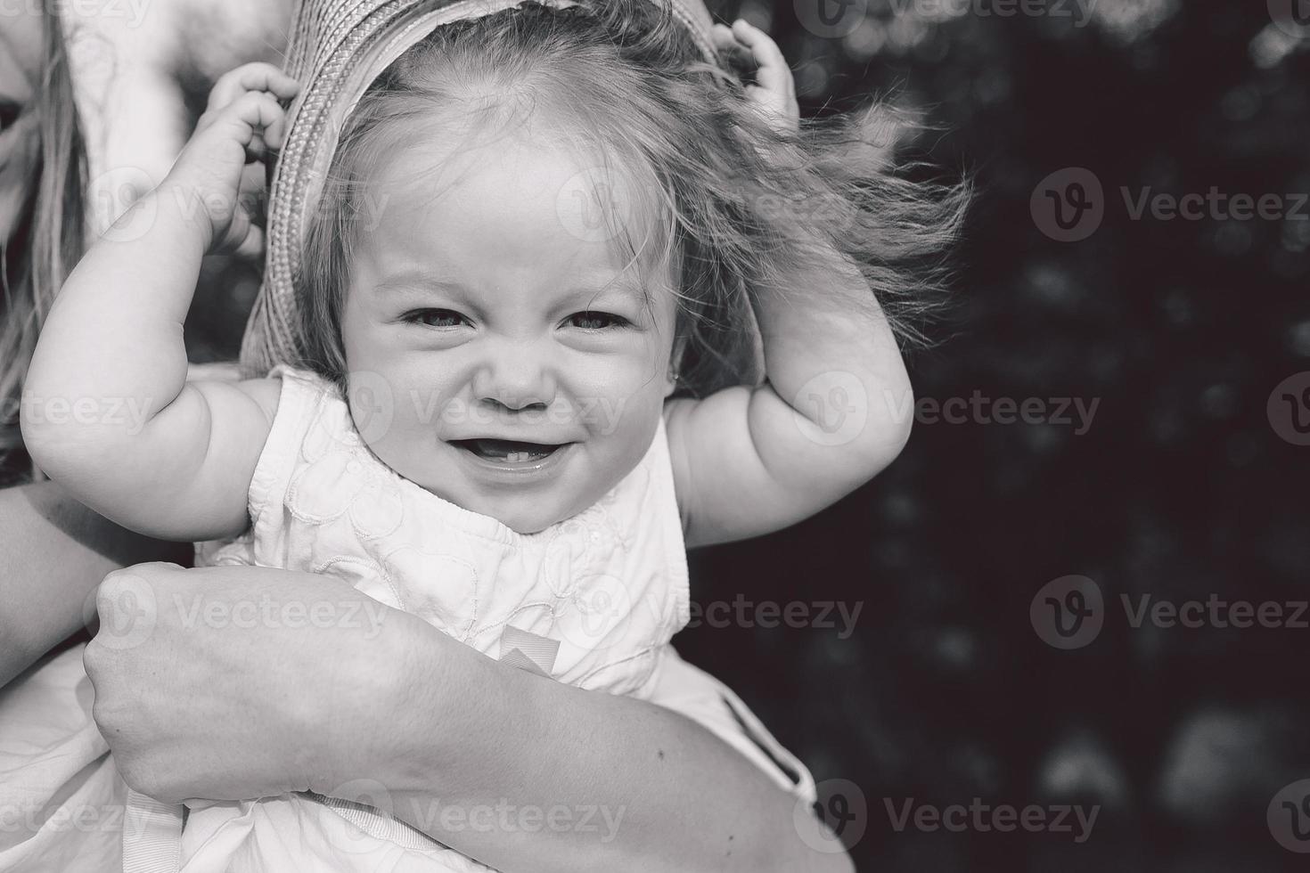 mother and daughter together outdoors photo