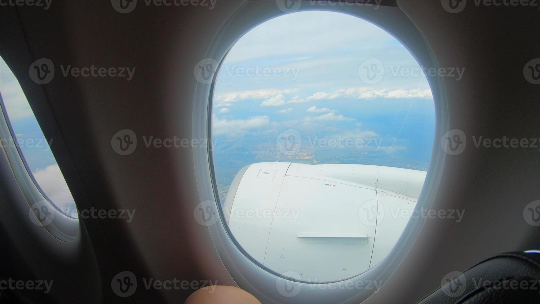 View from the window of a passenger airplane of a landscape photo