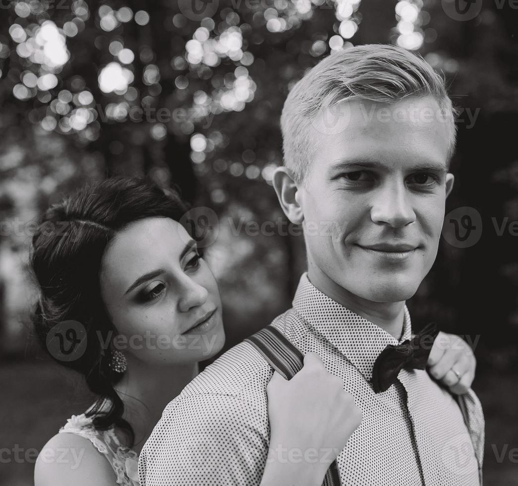 Beautiful wedding couple posing photo