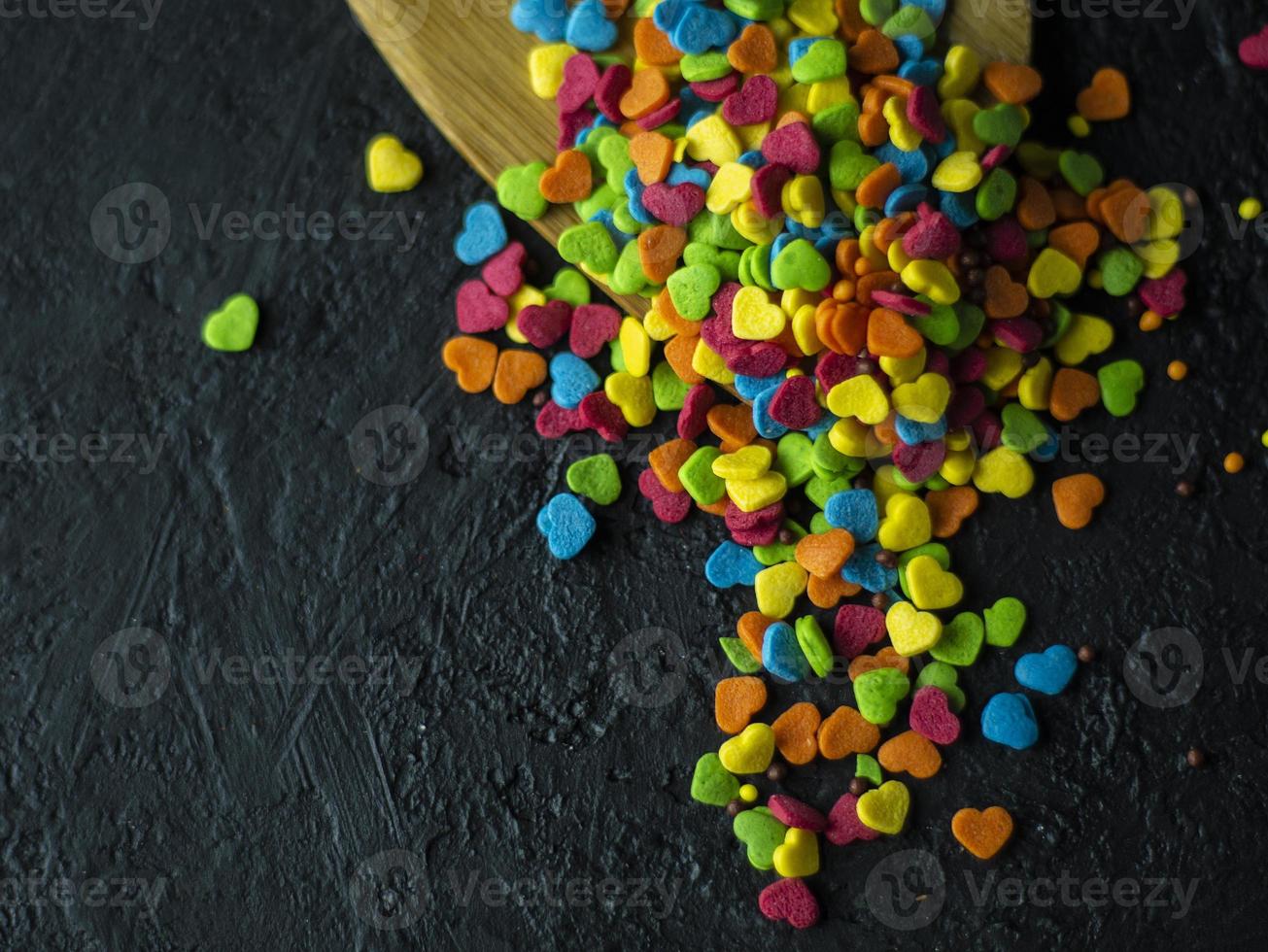 Sweets on a dark stone background photo