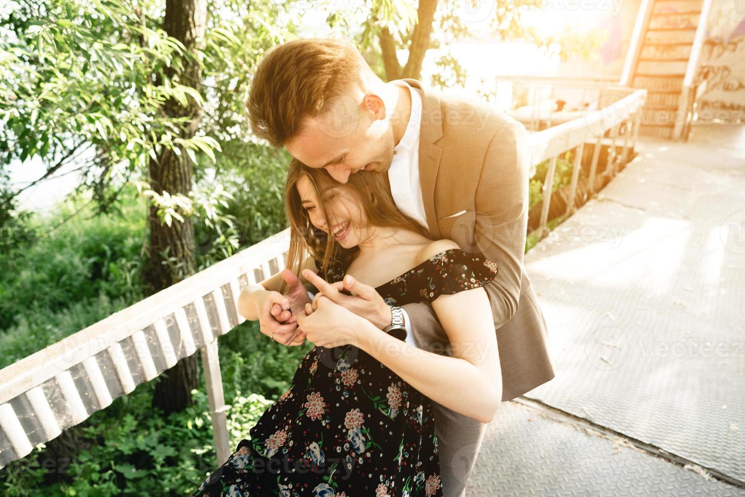 A pair of lovers posing on the camera. photo