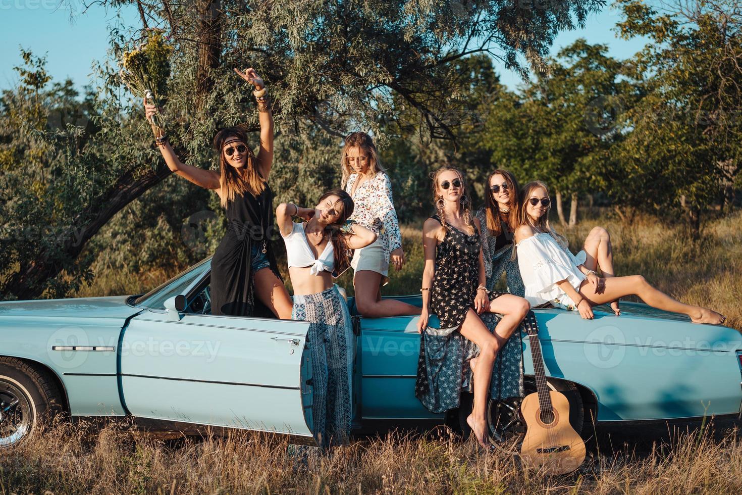 Six girls have fun in the countryside photo
