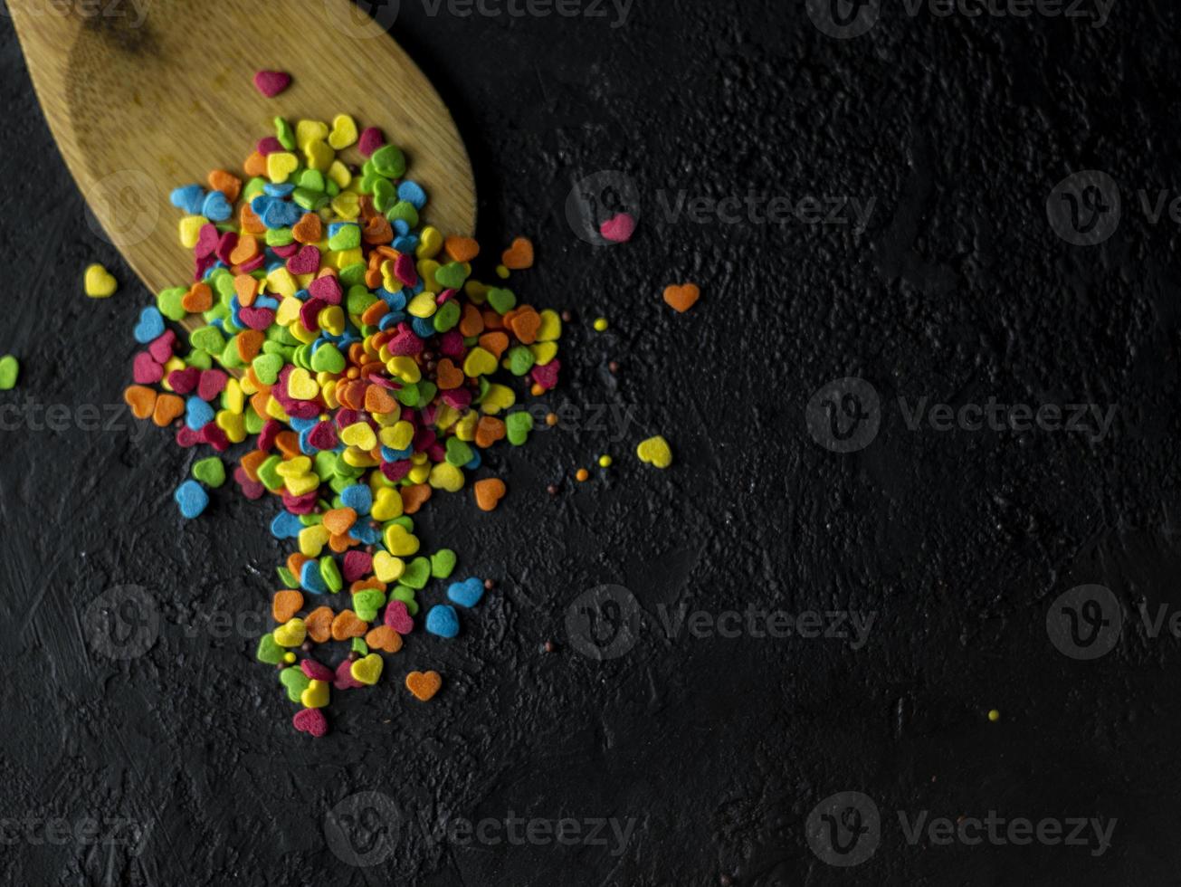 Sweets on a dark stone background photo