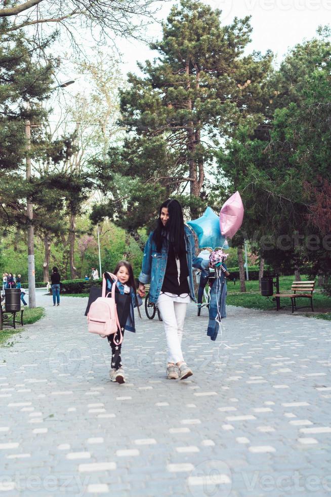 mom and little girl have fun photo