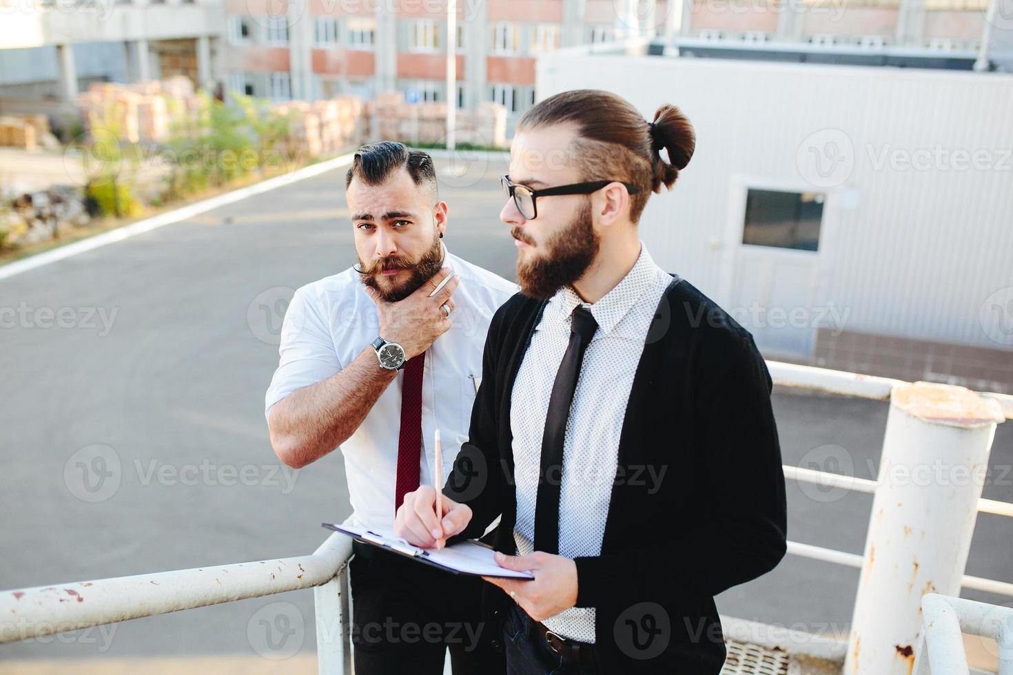 Two businessman at work photo