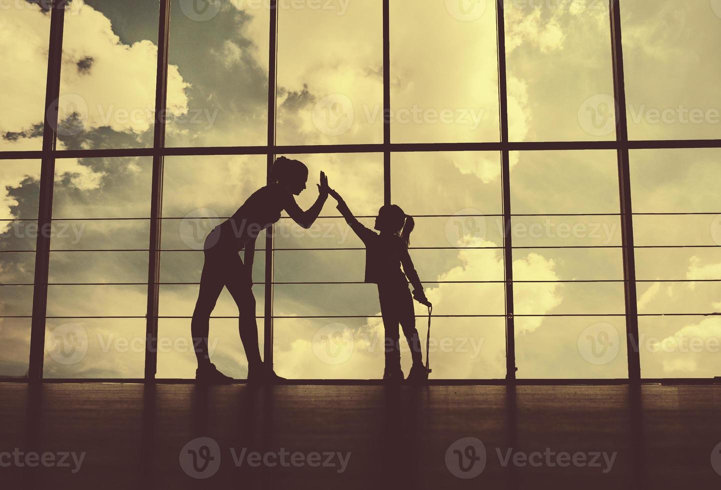 Charming family spends time in the gym photo