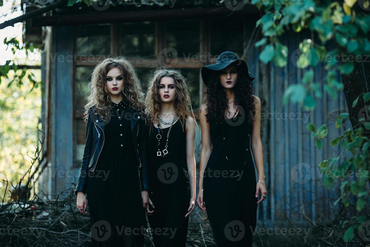 three vintage women as witches photo