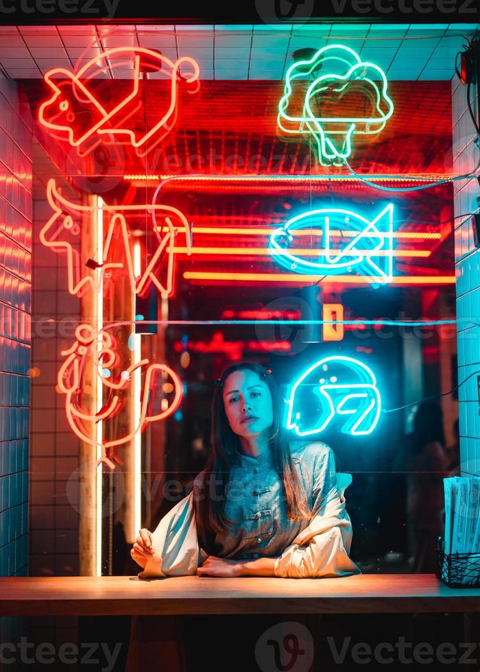 Beautiful girl in a window cafe photo