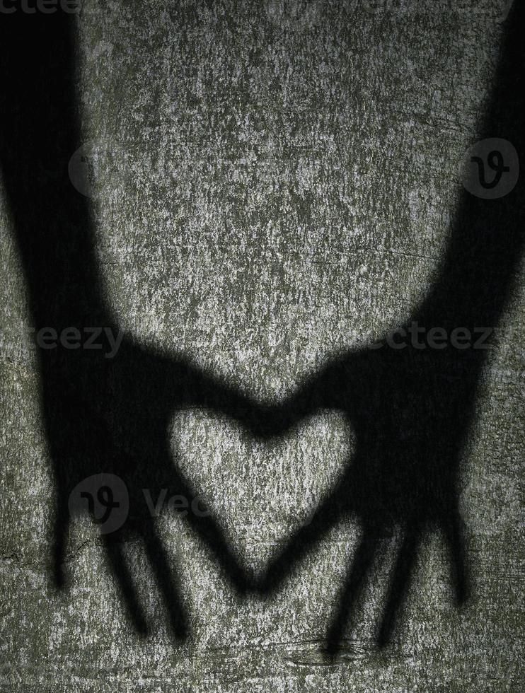 Two shadows hands photo