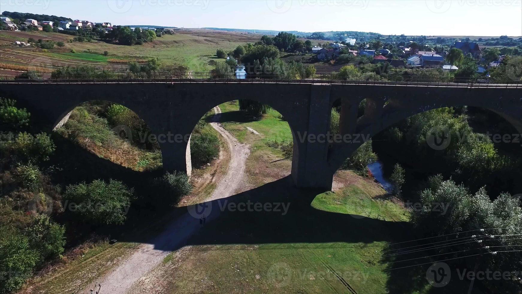 aerial shot of the stone railway bridge photo