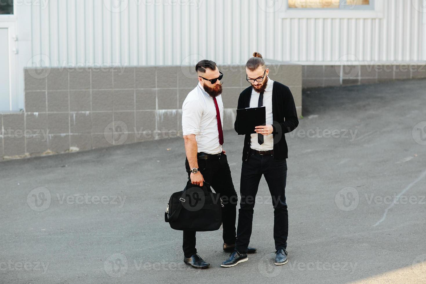 Two businessman at work photo