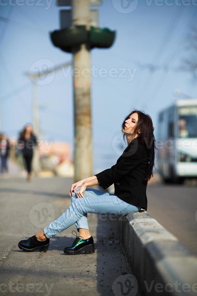 beautiful girl on the background of the road photo