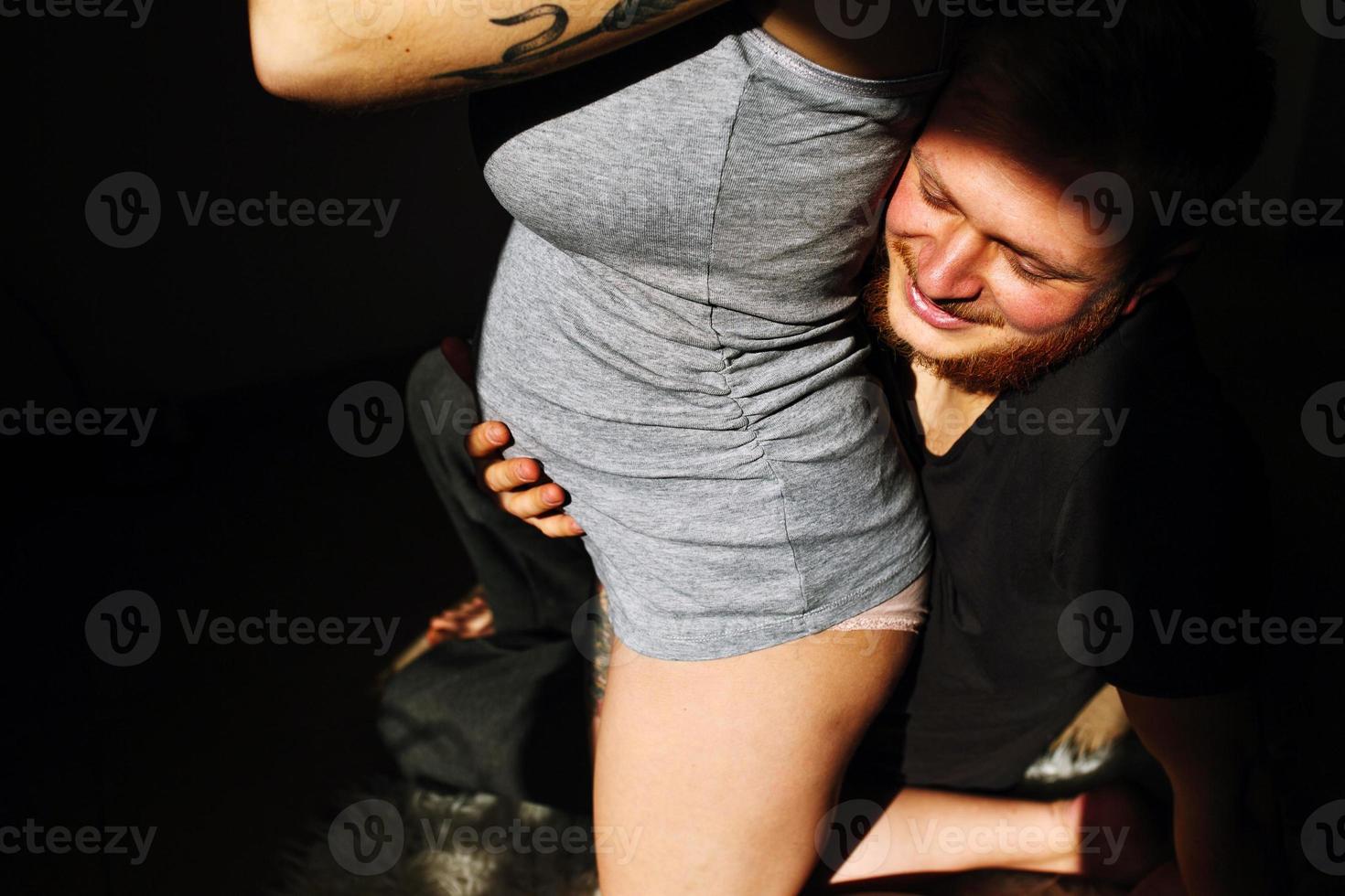 husband and pregnant wife photo