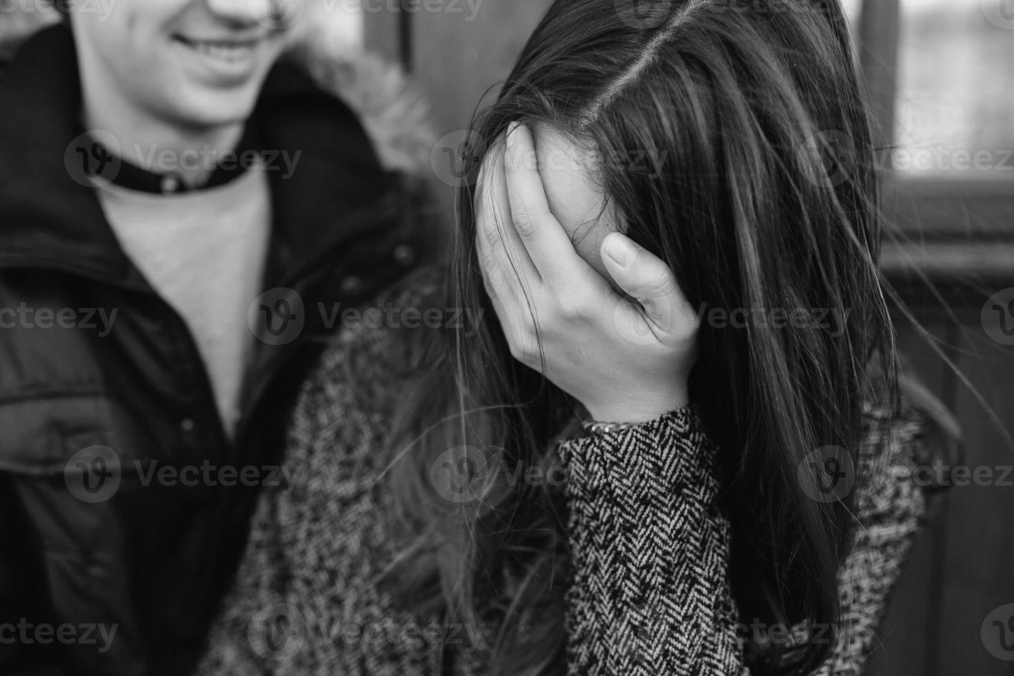 Beautiful young adult couple posing at camera photo