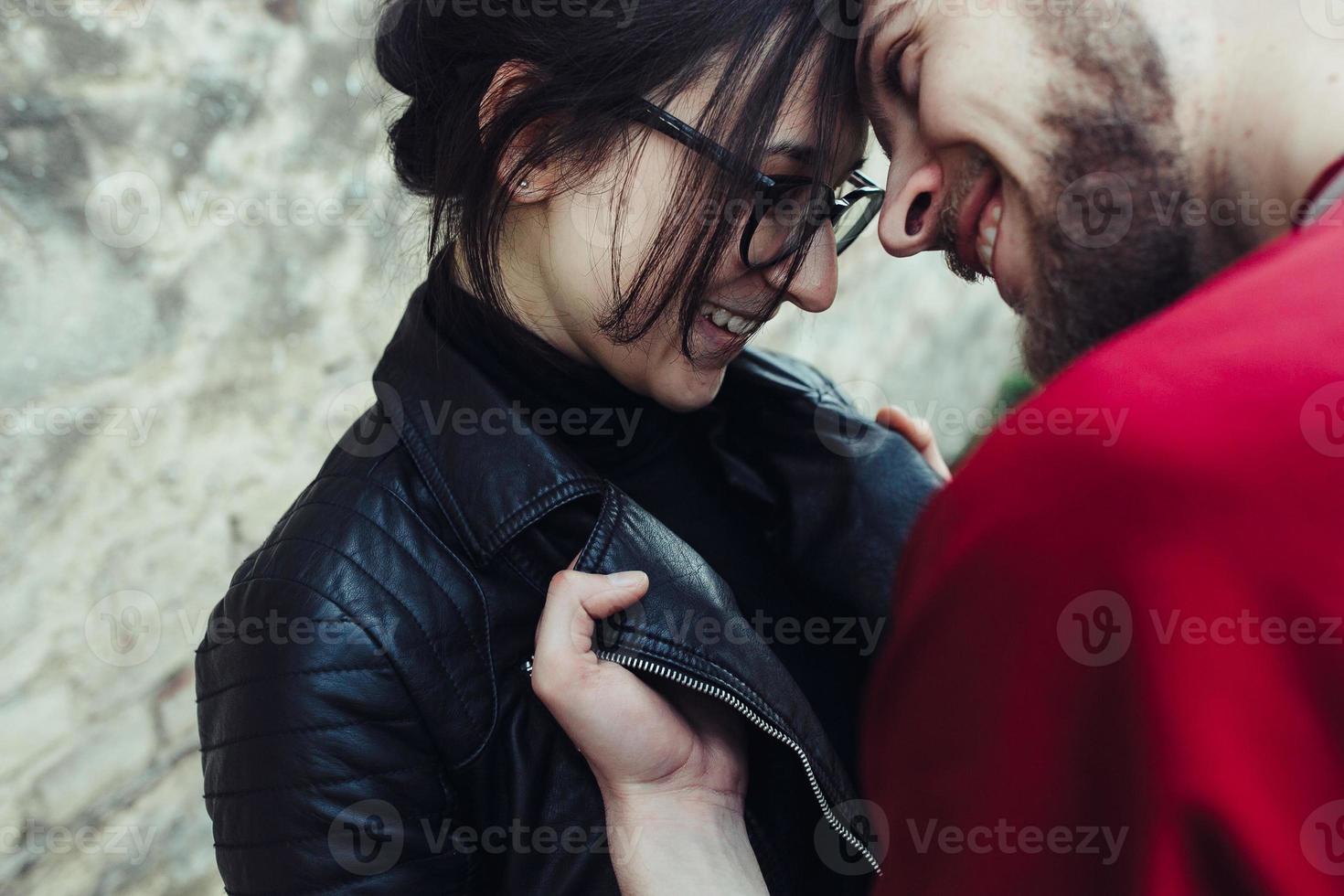 young beautiful couple fooling around photo