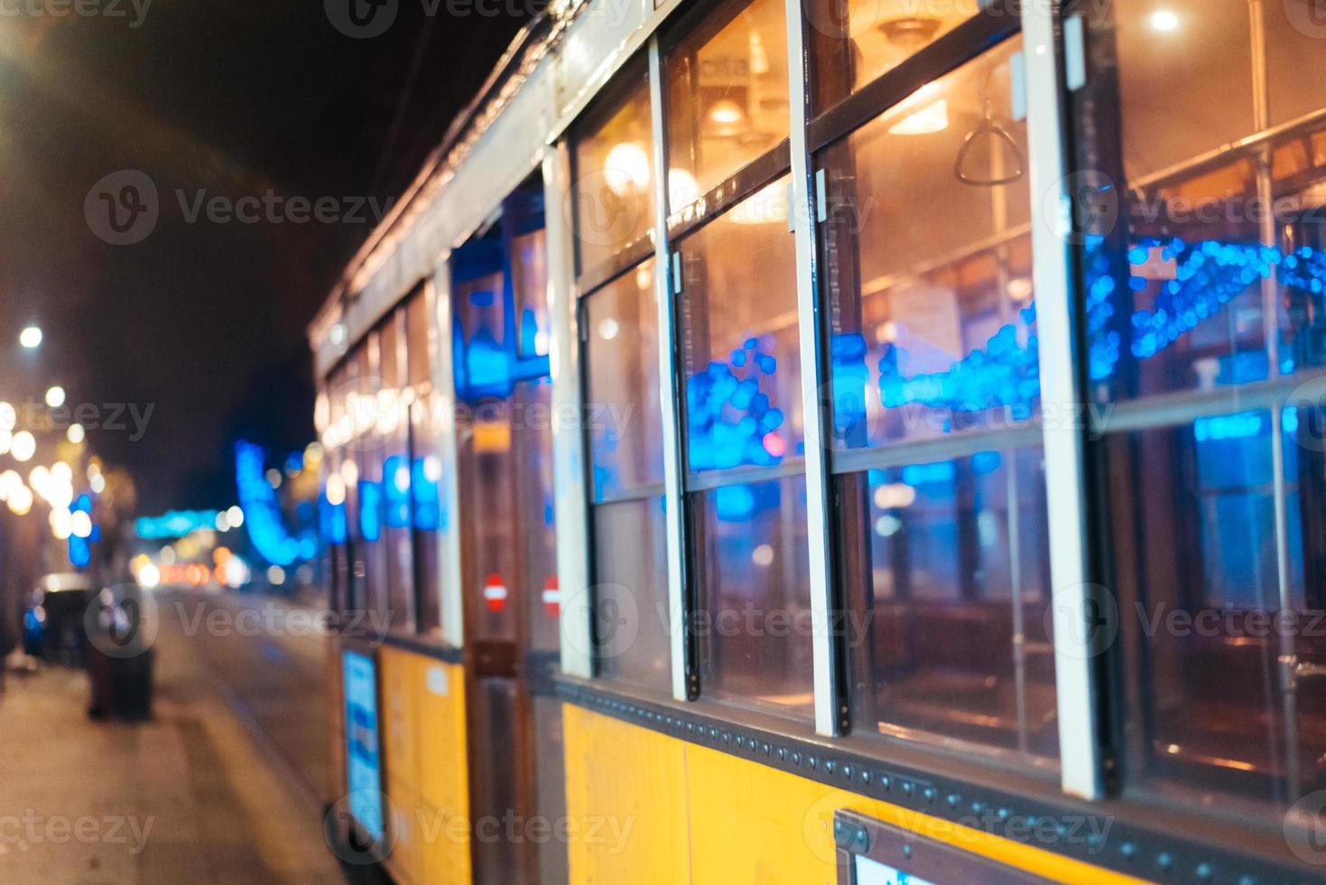 tram on the night street photo