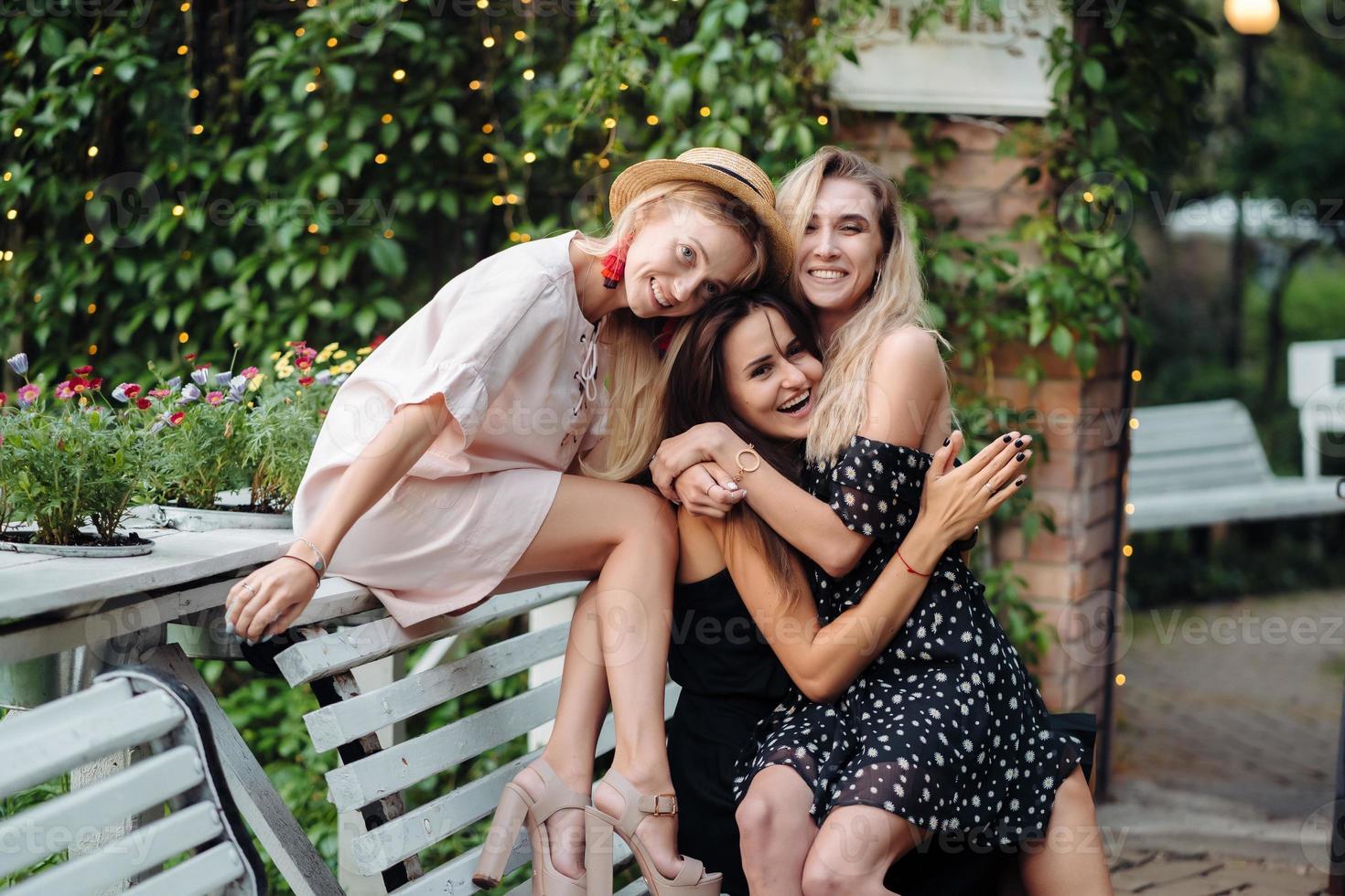 three girls on the bench photo