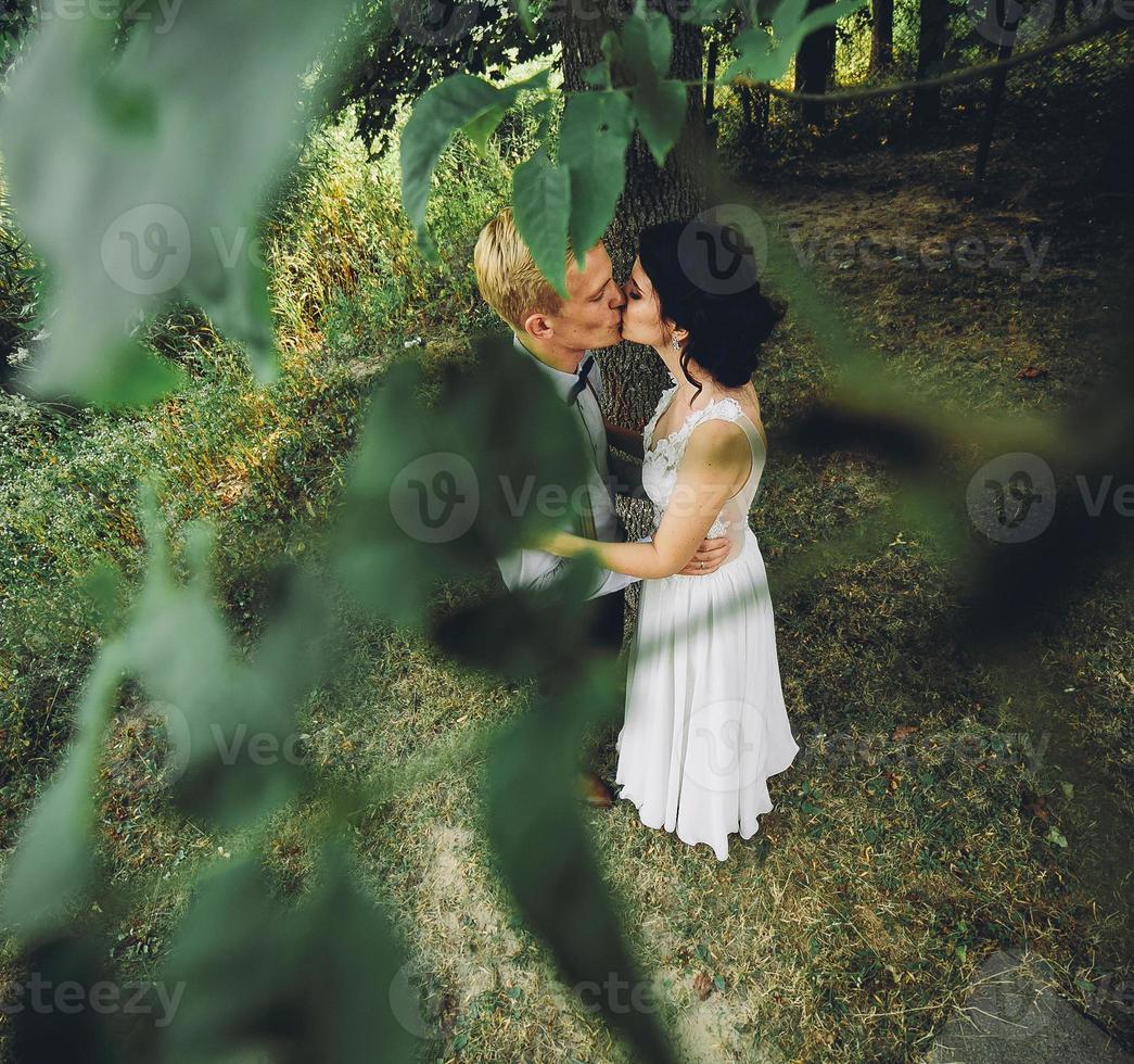 Beautiful wedding couple posing photo