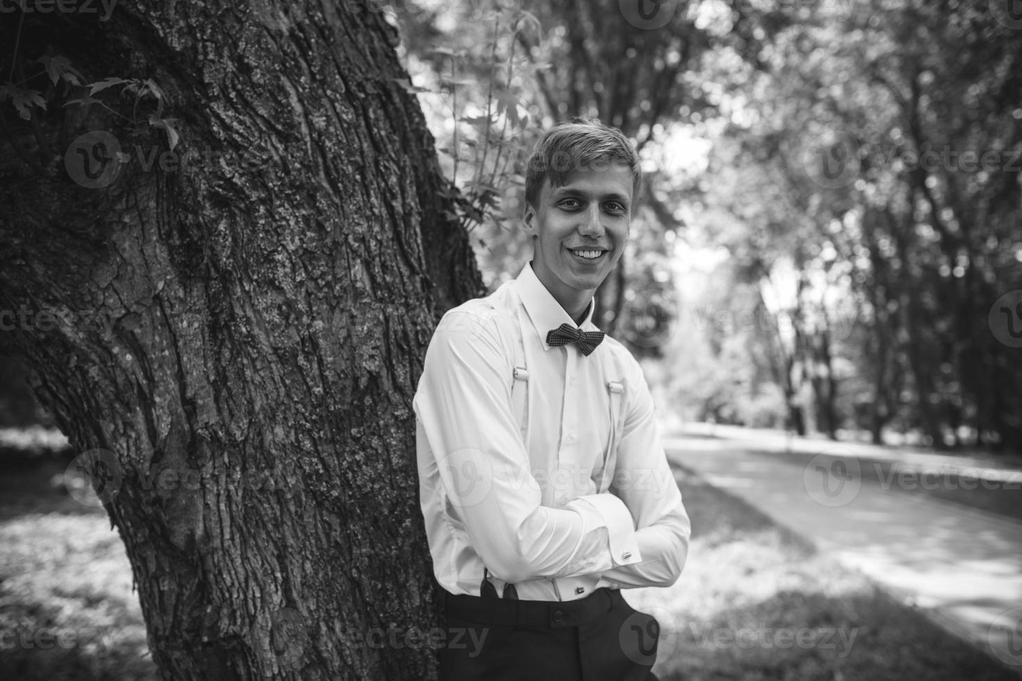 Groom in the forest photo