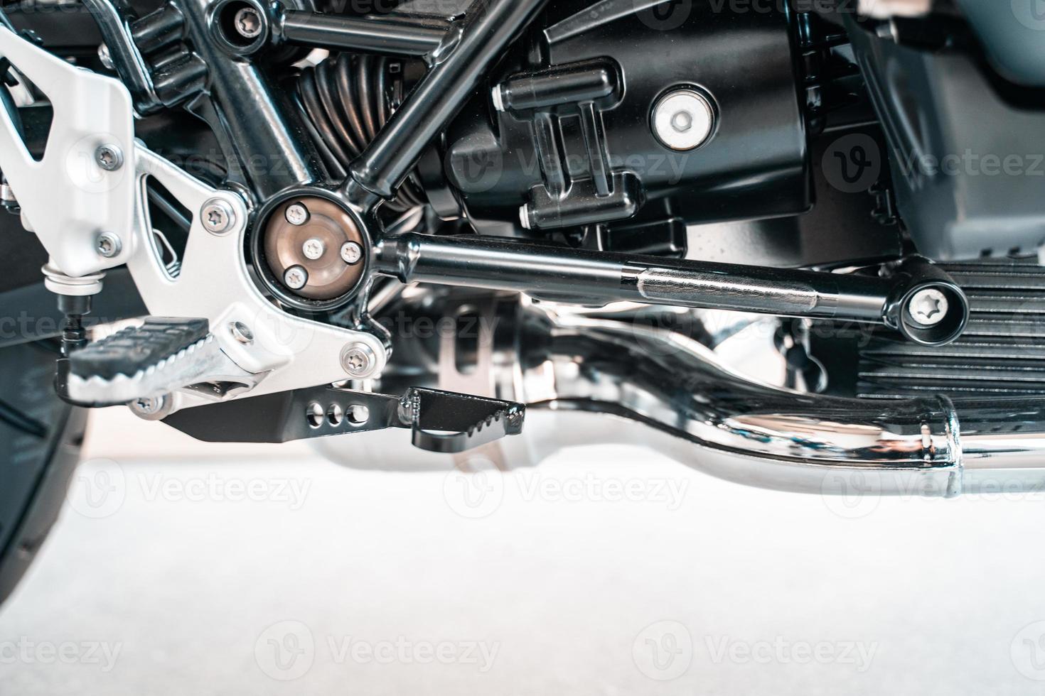 Cropped image of new motorcycle in shop. photo