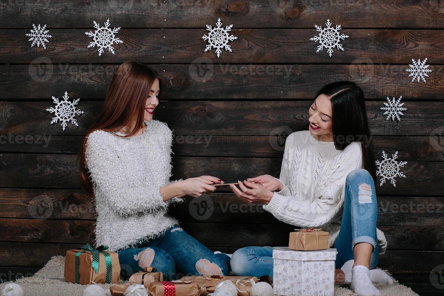 Sister gives her sister a tablet photo