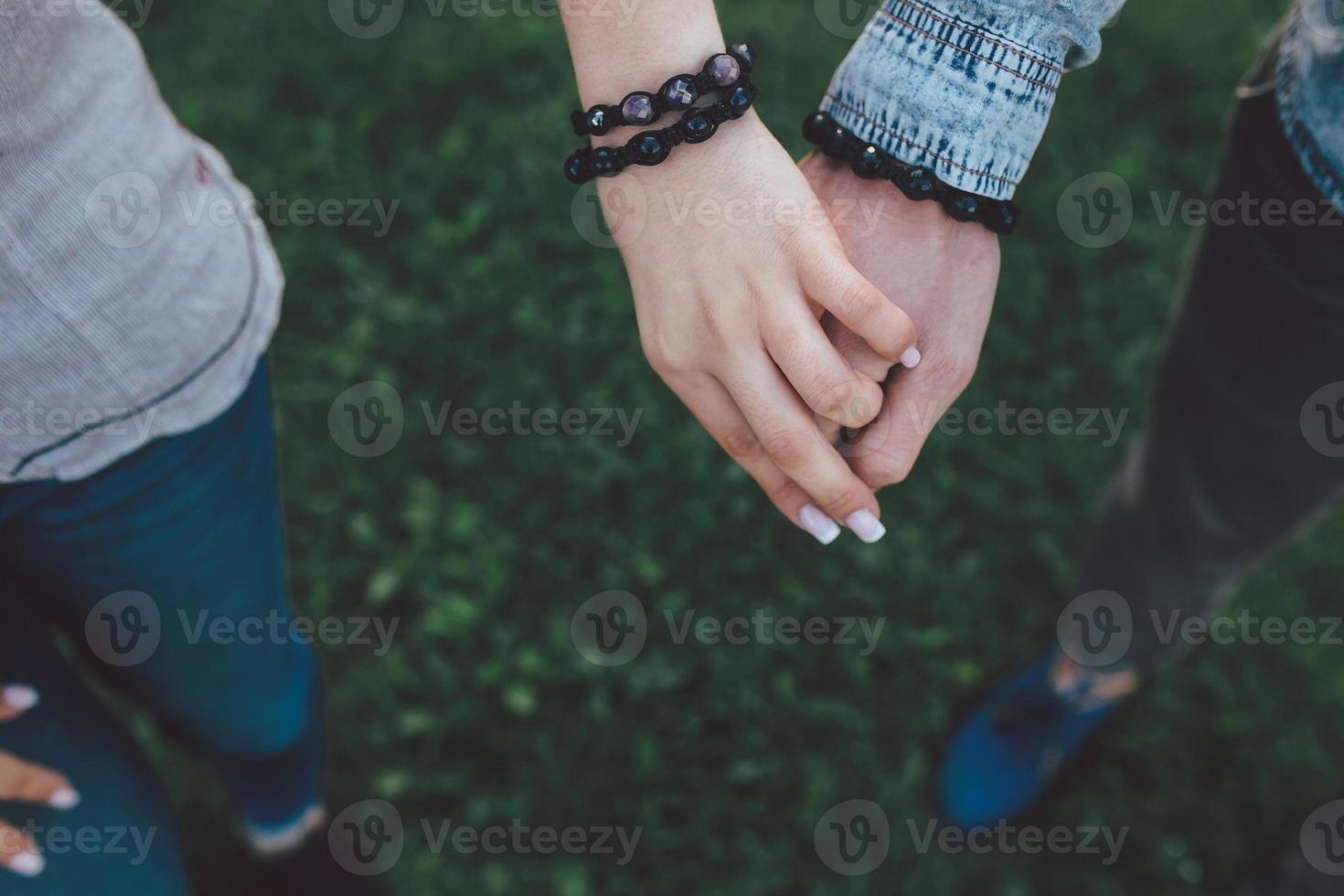 Happy couple holding hands photo