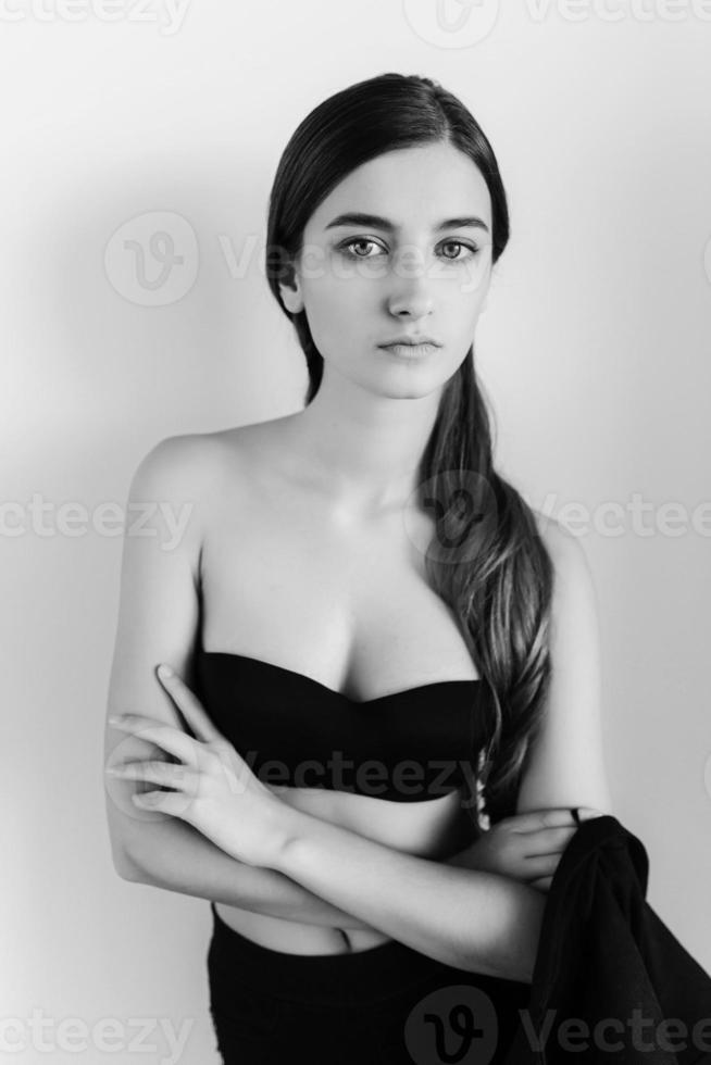 young girl in a black dress photo
