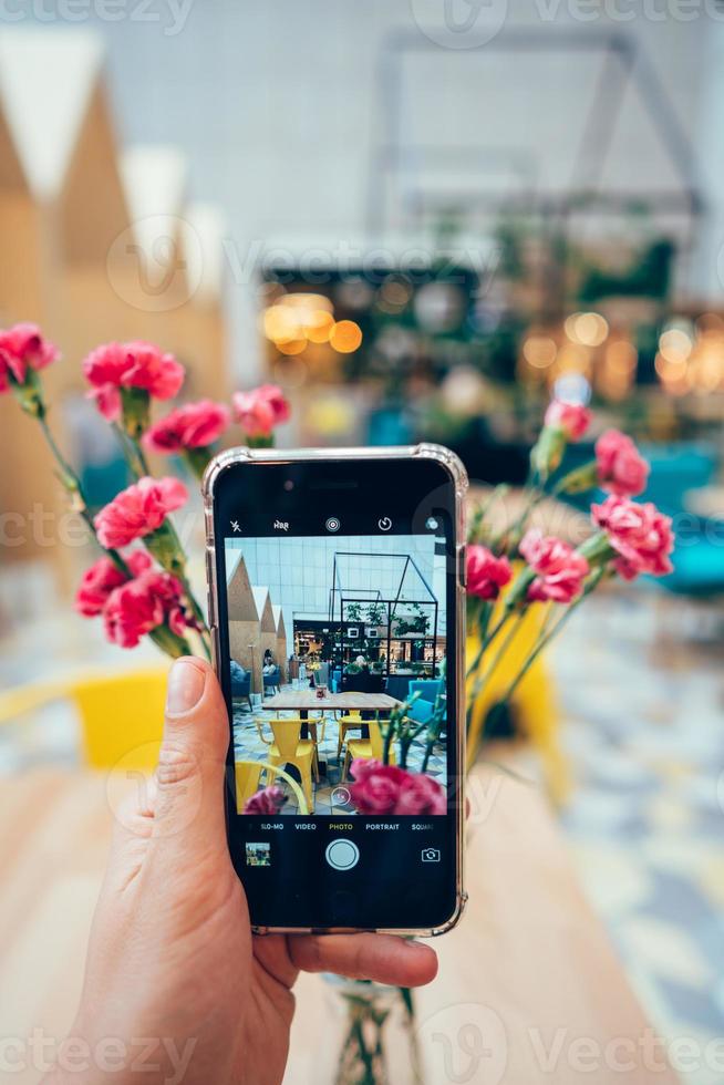 Blur restaurant, on the table is a flower photo