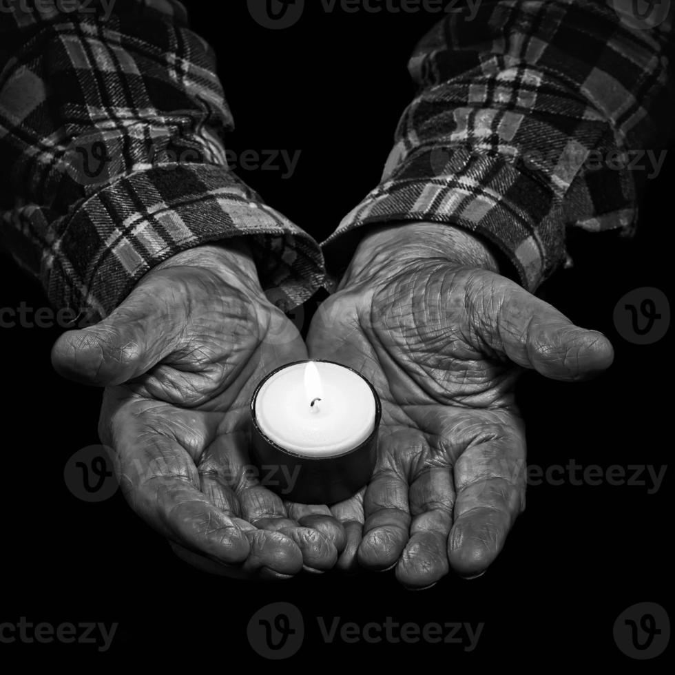 Hands and candle photo