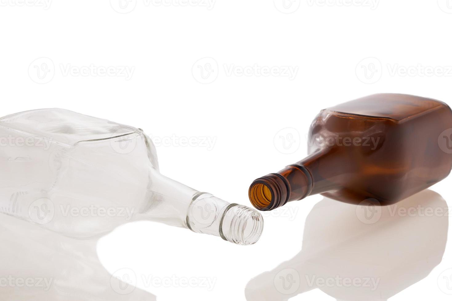 Two bottles lying photo