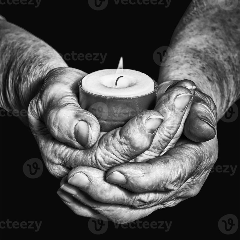 Hands and candle photo