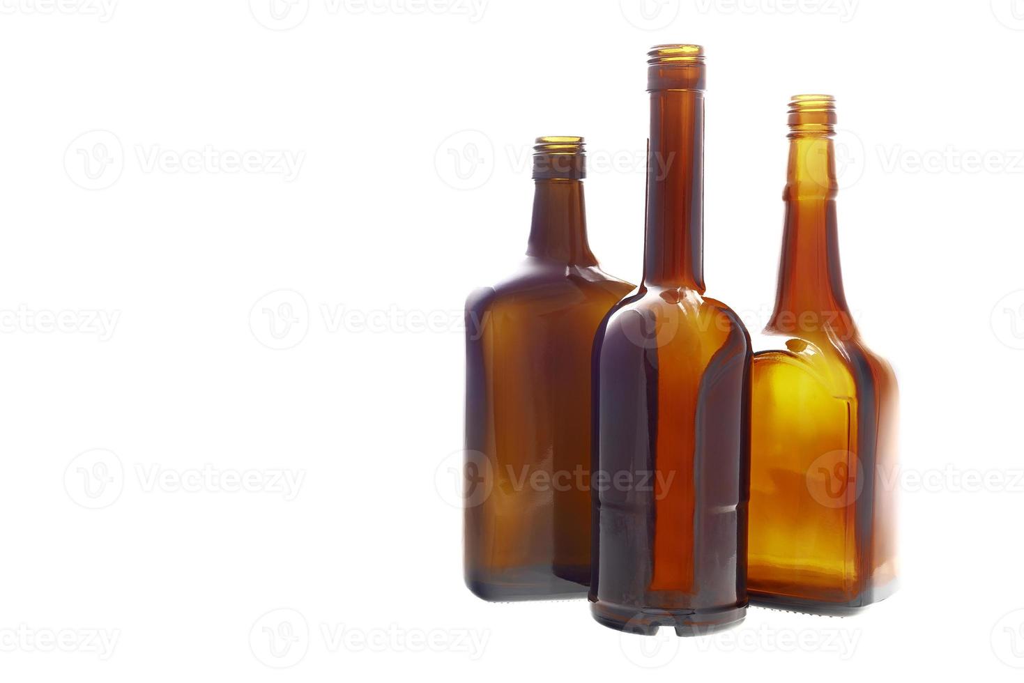 Three bottles standing photo