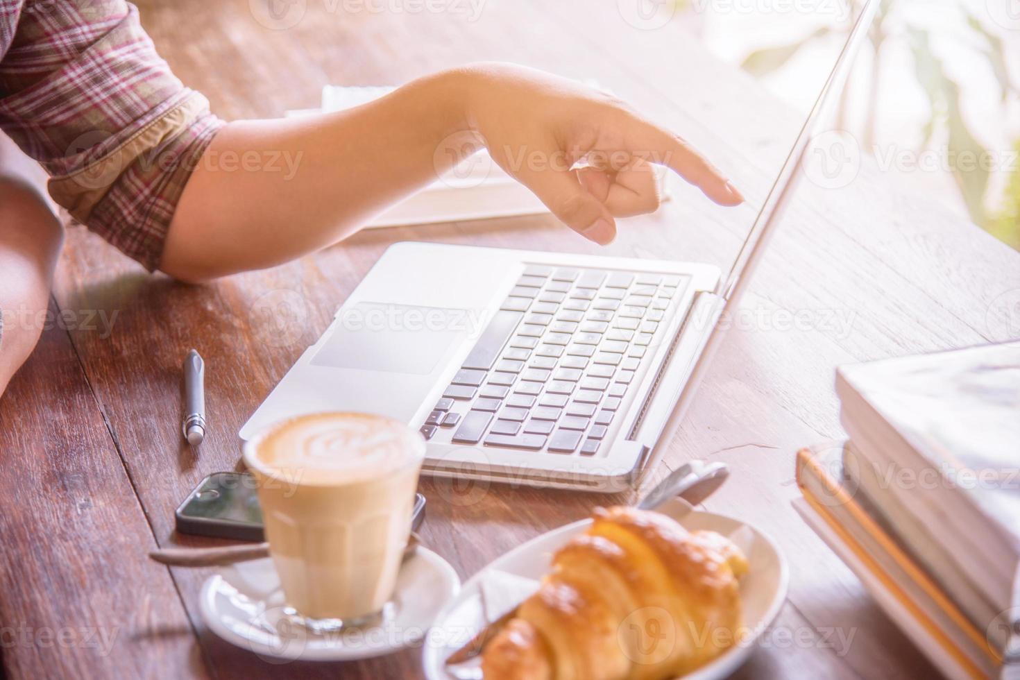 A business man using laptop. photo