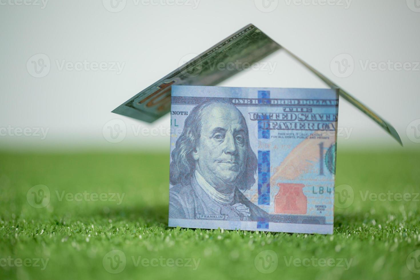 house property mortgage with cash money dollar bill on table concept of business finance, saving for buy home, investment loan, american currency, sale estate, bank payment, sell-rent real estate photo