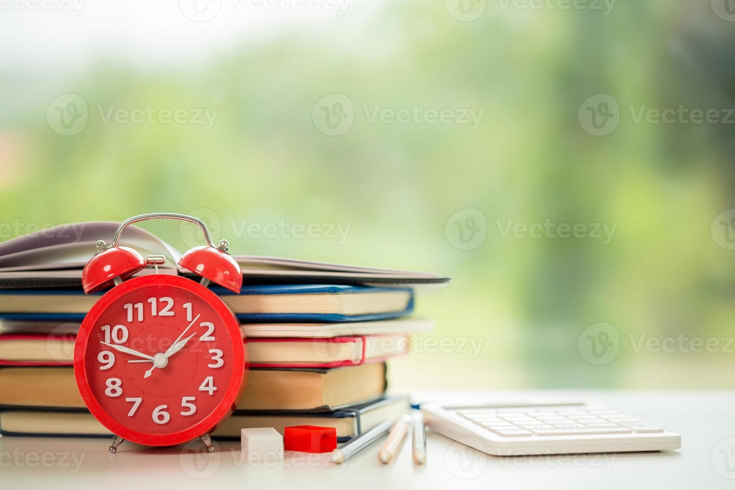 Object education green nature background with stack of ancient books or old bible, open paper book on wooden table with copy space. concept of back to school, research study photo