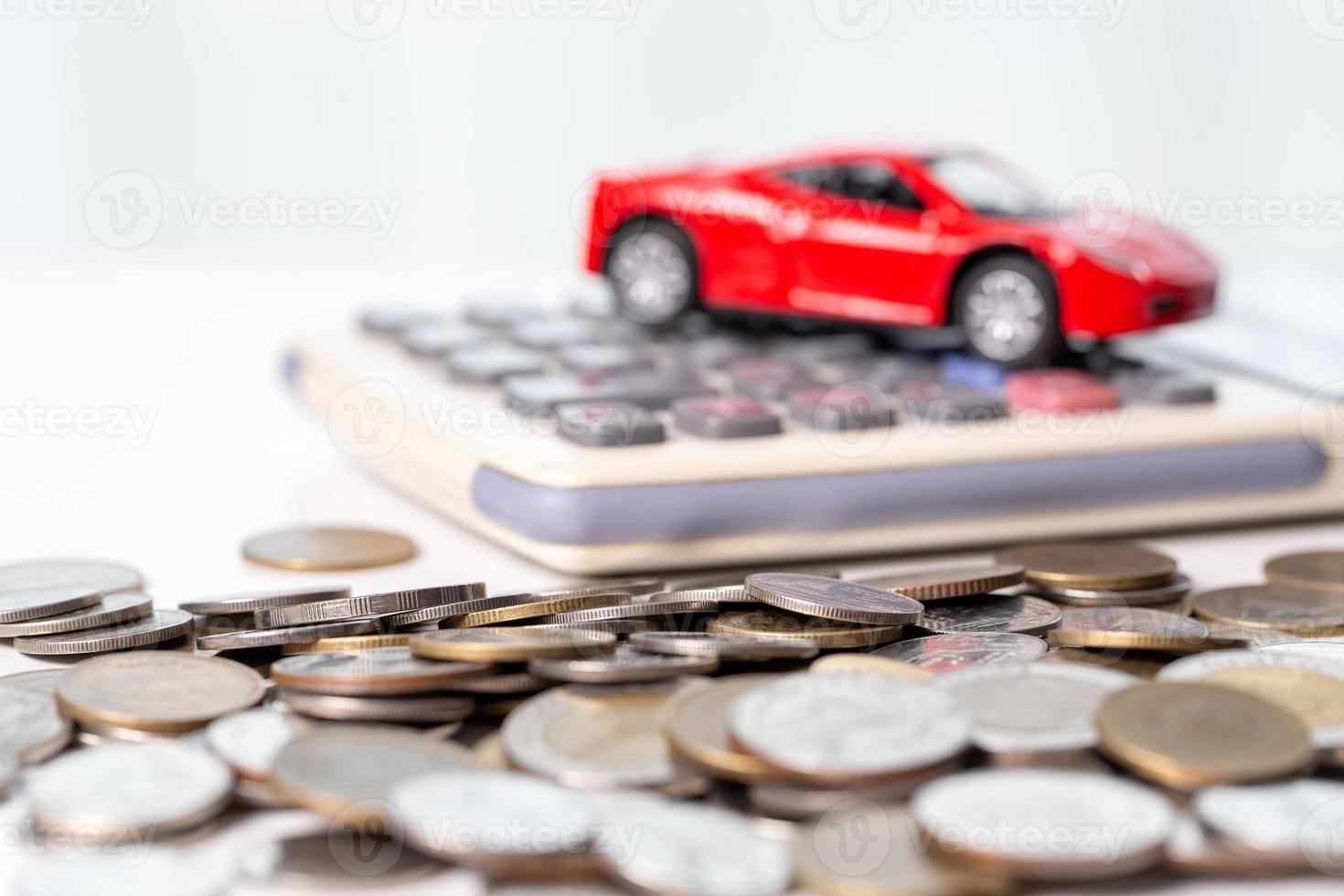 Car toy vehicle with stack coin money on background. Planning to manage transportation finance costs. Concept of car insurance business, saving buy - sale with tax and loan for new car. photo