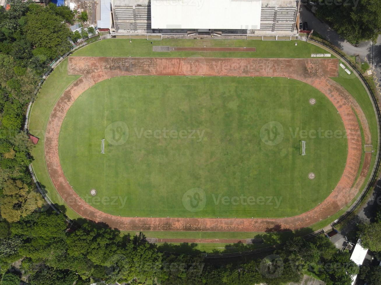 Top aerial view of traditional soccer field in Indonesia photo