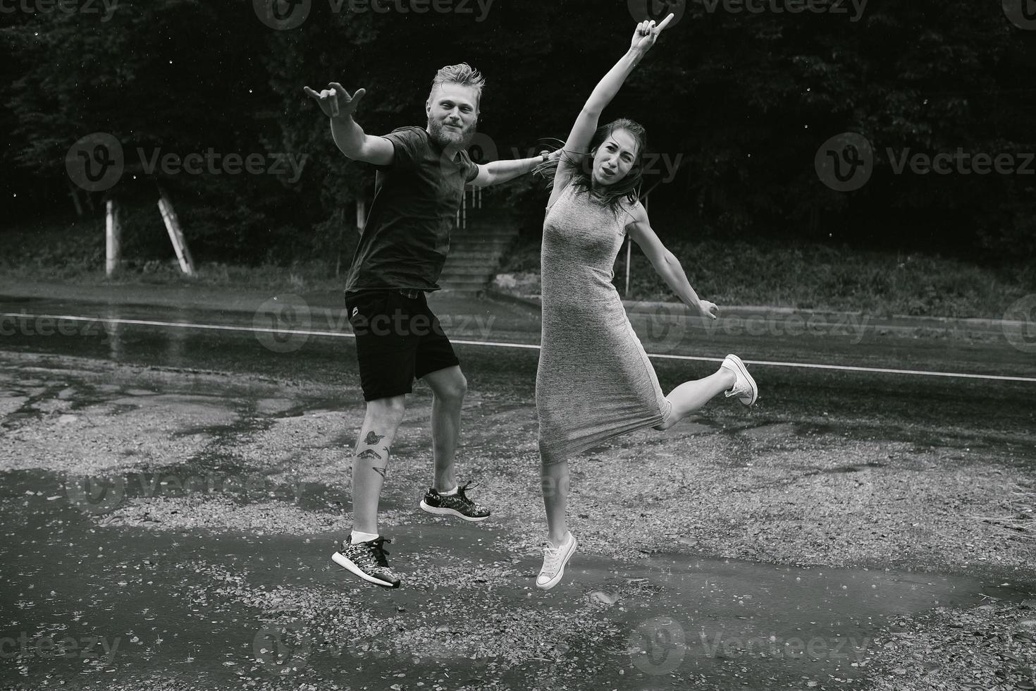 beautiful couple in the rain photo