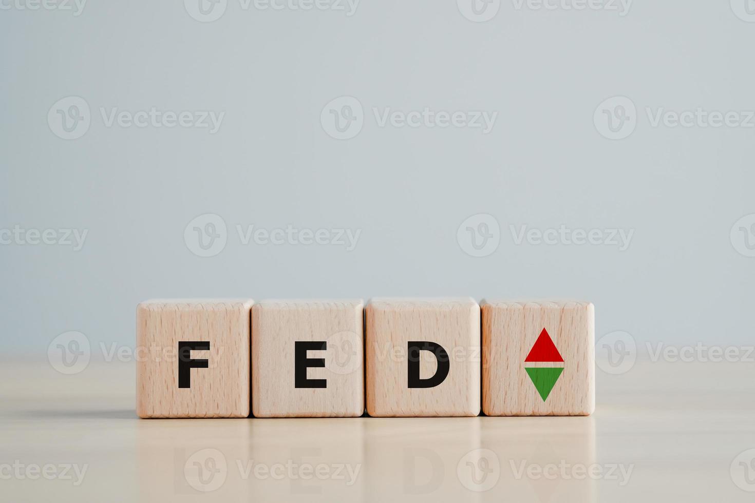 FED, federal reserve, Control interest rates, Inflation, Interest rates. World economy crisis, American economy and business concept. FED word on Wooden block with arrow up and down. photo