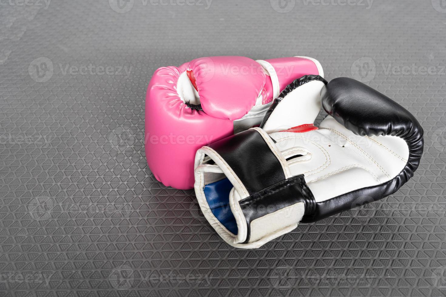 pink and black Boxing glove in punching in woman concept. 11547964