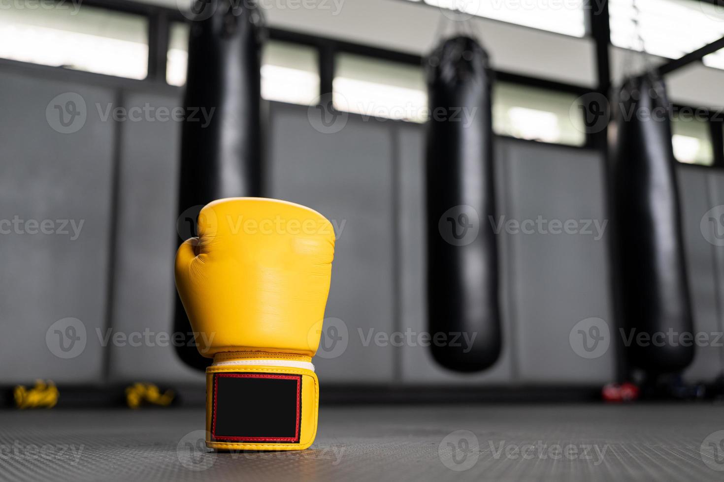 yellow boxing gloves in Gym Fitness. photo