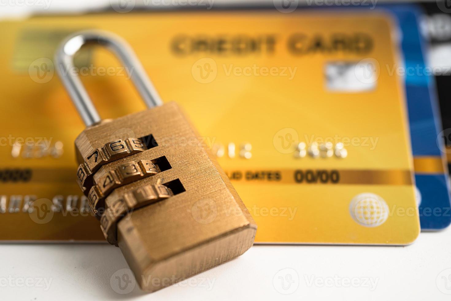 Credit card with password key lock security, exchange finance concept. photo