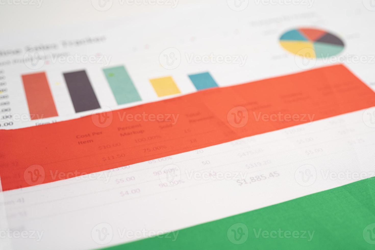 Hungary flag on graph background, Business and finance concept. photo