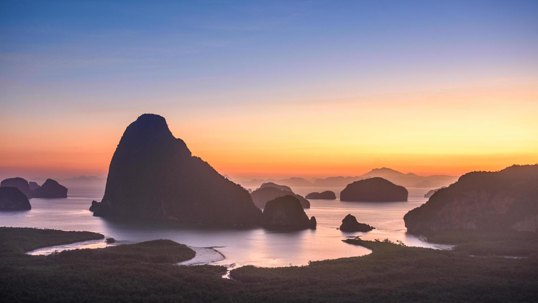 Sunrise at Samed Nangshe. This is the most famous point of view in Phang Nga province. photo