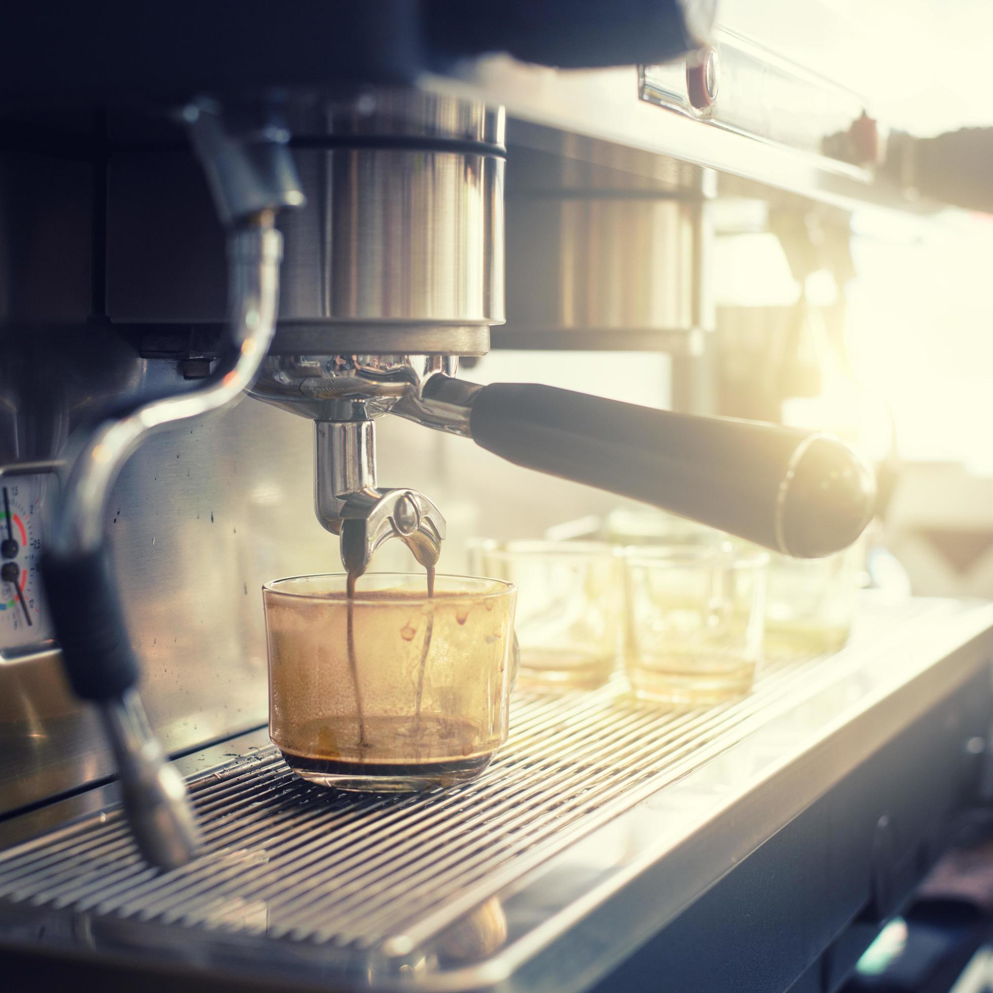 Espresso machine brewing a coffee 11550967 Stock Photo at Vecteezy